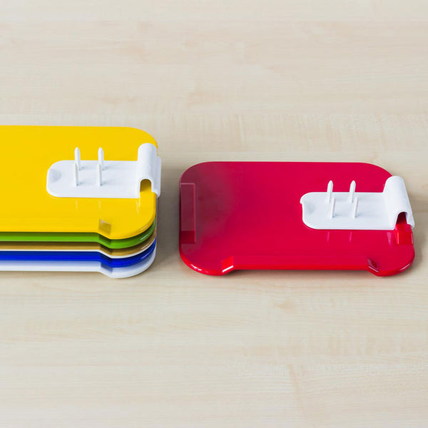 ORNAMIN Food Preparation Aid with stacked boards and white holders on a light wooden surface, angled view.