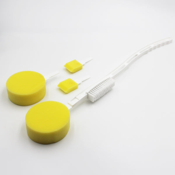 Homecraft Foot Brush & Sponge with 2 round sponges, 2 small swabs, and a contoured foot brush on plain background, top view.
