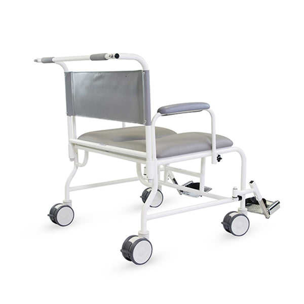 Prism Medical Freeway T100 bariatric shower chair with wheels, padded seat, backrest and adjustable footrests, side view.