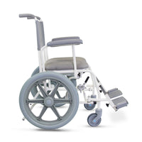 Prism Medical Freeway T60 Self-Propel Shower Chair with padded seat, antimicrobial finish, armrests, large wheels and footrests, side view.