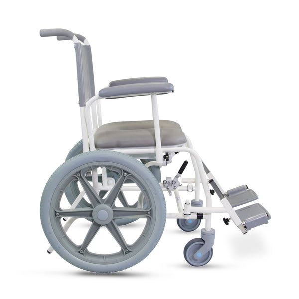 Prism Medical Freeway T60 Self-Propel Shower Chair with padded seat, antimicrobial finish, armrests, large wheels and footrests, side view.