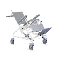 Prism Medical Freeway T80 paediatric reclining shower chair with adjustable tilt, support and wheels, side view.