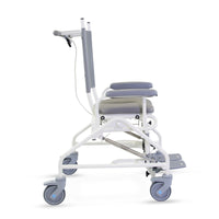 Prism Medical Freeway T80 Paediatric Reclining Shower Chair with padded seat, backrest, large wheels and footrest, side view.