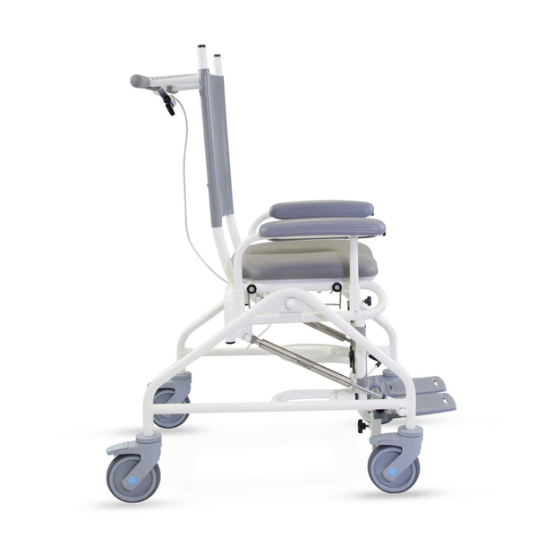 Prism Medical Freeway T80 Paediatric Reclining Shower Chair with padded seat, backrest, large wheels and footrest, side view.
