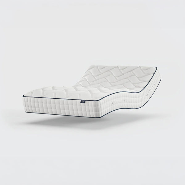 Opera Beds Gel 1000 Adjustable Mattress with quilted pattern bending at the middle, plain background, side view.