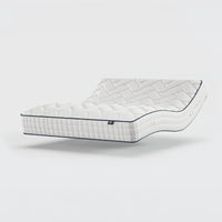 Opera Beds Gel 1000 Adjustable Mattress elevated and curved, quilted design visible against plain background, side view.