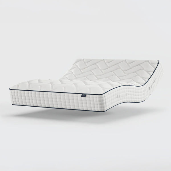 Opera Beds Gel Pro 4000 Adjustable Mattress with quilted top and grid sides, elevated on a plain background, angled view.