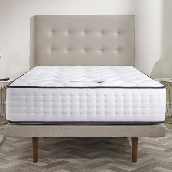 Opera Beds Gel Pro 4000 Adjustable Mattress with tufted headboard on wooden legs, bedroom setting, front view.