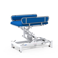 Medi-Plinth hydraulic changing table with side rails, NHS-approved, MRSA-resistant, white wheeled metal frame, side view.