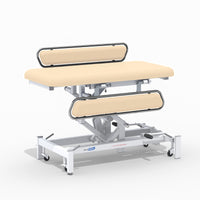 Medi-Plinth hydraulic changing table with MRSA-resistant upholstery, side rails, wheels and metal frame, side view.