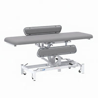 Medi-Plinth hydraulic changing table with MRSA-resistant upholstery, metal frame and wheels, side view.