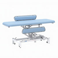 Medi-Plinth hydraulic changing table with metal frame, MRSA-resistant padding, side safety rails and wheels, side view.