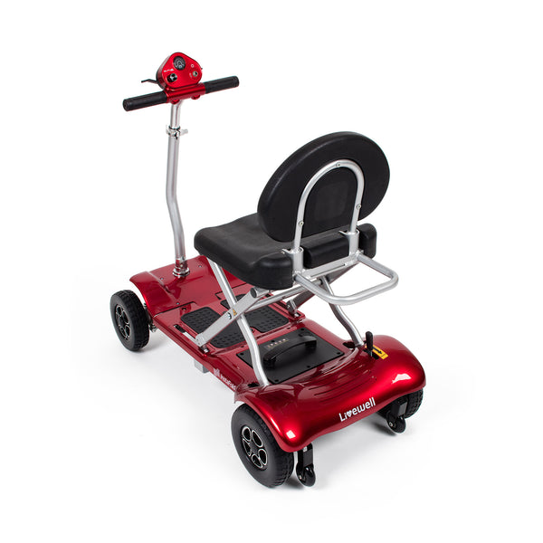 Drive Instafold Folding Mobility Scooter with black cushioned seat, handlebars and four wheels, rear angled view.