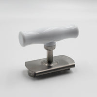 Aidapt jar opener with plastic handle, metal grip for opening jars, on a plain background, top view.