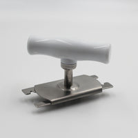 Aidapt jar opener with handle and flat base for easier gripping, on a plain background, front angle.
