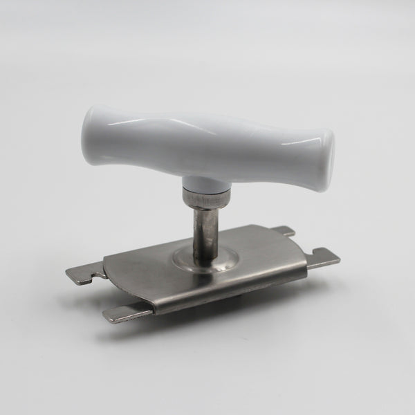 Aidapt jar opener with handle and flat base for easier gripping, on a plain background, front angle.