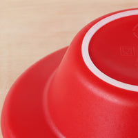 ORNAMIN Keep Warm Bowl with non-slip base upside down on light wooden surface, top-down view.