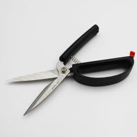 Easi-Grip Kitchen Shears with self-opening mechanism on a white surface, side view.