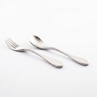 Buckingham Knork and Spoon Child Set for ages 3 plus, placed side by side on a plain white surface, top view.