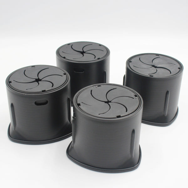 Langham SureGrip Furniture Raisers with spiral lids, round design, on a white surface, overhead view.