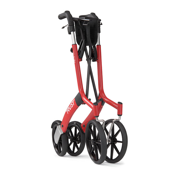 Trust Care Let’s Go Out Rollator, foldable with four large wheels, upright position for transport or storage, front view.