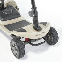 Motion Healthcare Lithilite Scooter with front puncture-proof wheels and lightweight lithium battery, close-up.