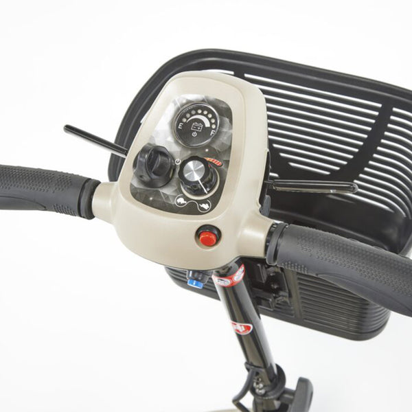 Motion Healthcare Lithilite Scooter control panel with lightweight lithium battery and puncture-proof wheels, close-up.