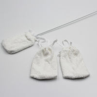 Homecraft toe washer with long handle and two spare pads, top view.