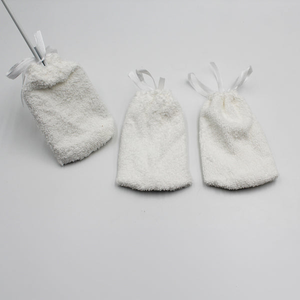 Pair of Homecraft towelling pads for Long Handled Toe Washer on plain background, top view.