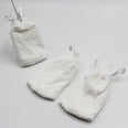 Set of three small drawstring pouches for storing replacement pads, shown grouped together, front view.