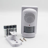 Easy Link motion activated memo reminder with voice recorder, 4 AA batteries, bracket and screws, front view.