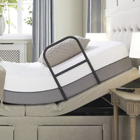 Opera Beds Motion Bed Grab Rail attached to adjustable bed with head raised, next to nightstand and window, side view.