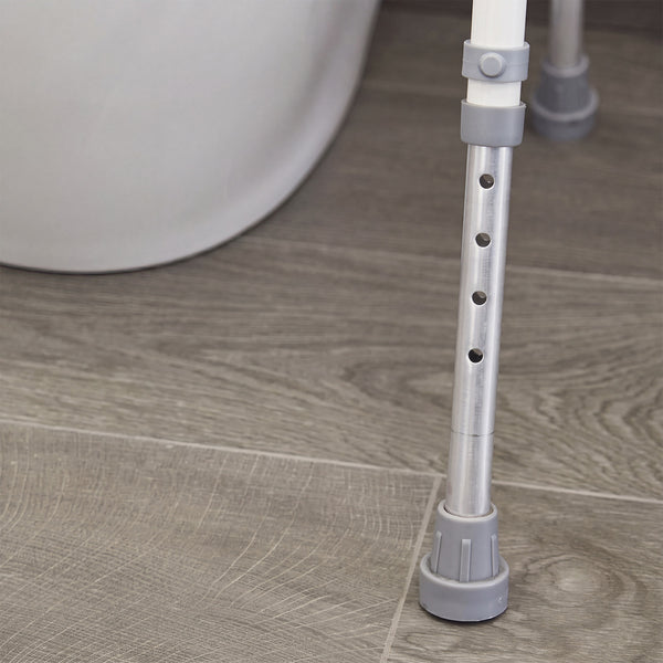 NRS Mowbray Lite Toilet Aid with adjustable aluminium leg and rubber tip, sturdy frame for toileting support, side view.