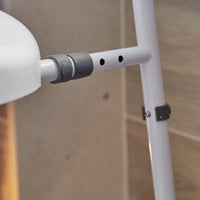 NRS Mowbray Lite Toilet Aid with adjustable pole, holes, and locking mechanism for bathroom support, close-up.