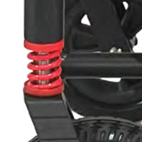 Coil spring suspension on Urathon Nira Lightweight Powerchair, close-up view.