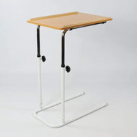 NRS Divan Overbed Table, height-adjustable, wheelchair accessible, metal legs and supports, shaped top, side view.