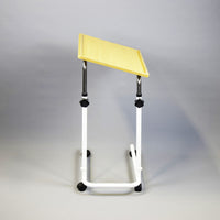 NRS Overbed/Overchair Table with wheels and white metal legs, plain background, front view.