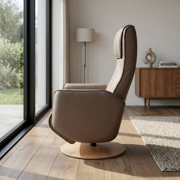 Orla Riser Recliner Swivel Chair on a circular wooden base, side view.