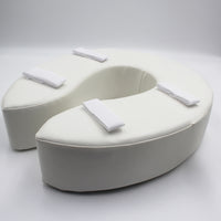 Homecraft Padded Raised Toilet Seat with soft horseshoe shape and four straps for secure fitting, top view.