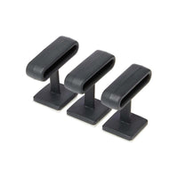 Homecraft Plug Pull Pack of 3, rectangular clips with self-adhesive bases arranged in a row, top view.