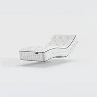 Opera Beds Premium Natural Pocket 2500 Mattress elevated to show pocket springs and quilted finish, side view.