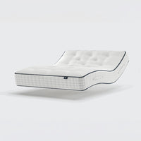 Opera Beds Premium Natural Pocket 2500 Mattress with tufting and pocket springs shown bending at an angle, side view.