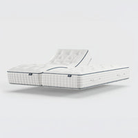 Two Opera Beds Premium Natural Pocket 2500 mattresses, one raised at the head and one flat, side view.