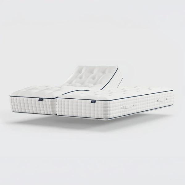 Two Opera Beds Premium Natural Pocket 2500 mattresses, one raised at the head and one flat, side view.