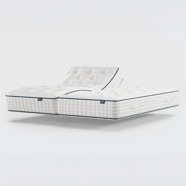 Opera Beds Premium Natural Pocket 2500 Mattress with adjustable pocket springs, shown elevated, angled side view.