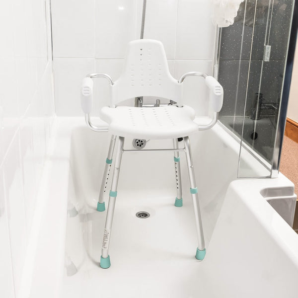 Gordon Ellis Prima shower stool with arms and back, height adjustable for use in bath or shower, front view.