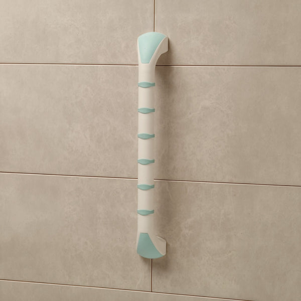 Gordon Ellis Prima Straight Grab Bar with soft grip, mounted vertically on tiled wall for support, close-up.