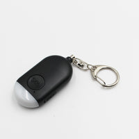 Lifemax Rechargeable Personal Alarm keychain with torch and metal ring on a plain white background, front view.
