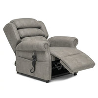 Rimini Dual Motor Tilt-in-Space Chair reclined with remote and pocket sprung seat cushion, side view.