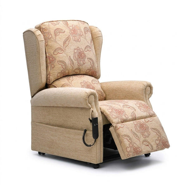Westbury dual motor riser recliner chair with raised footrest and wired remote on armrest, front angle view.